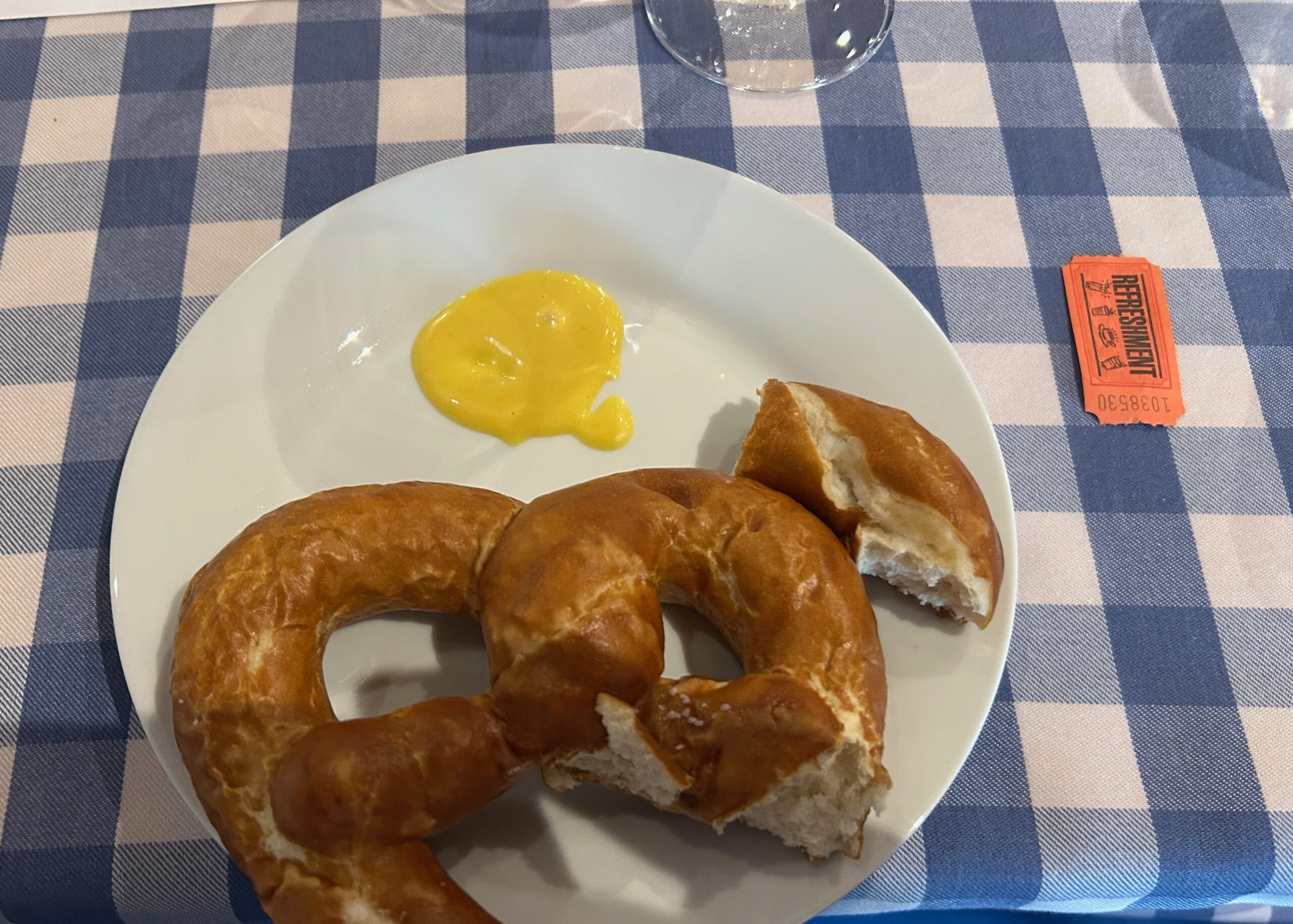 Traditional Bavarian Brezel eaten with mustard.