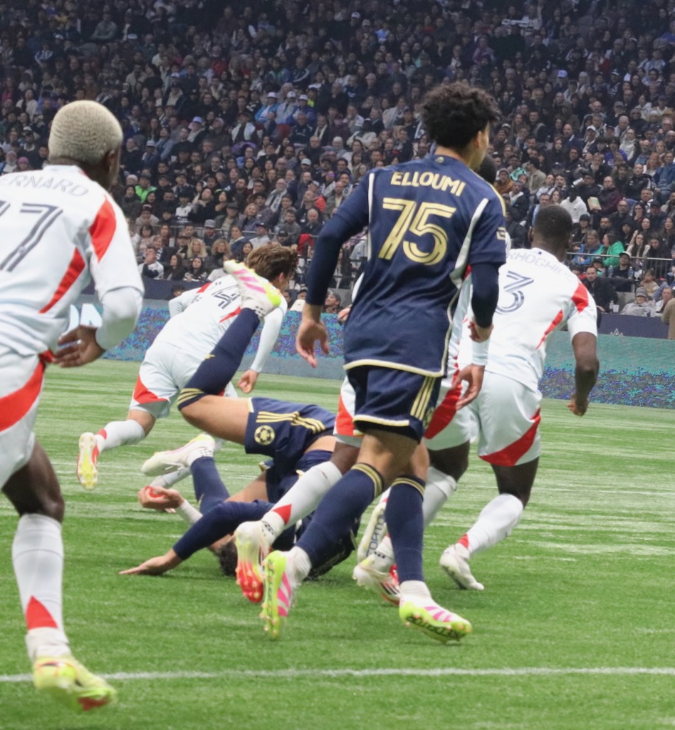 Müller falling down.