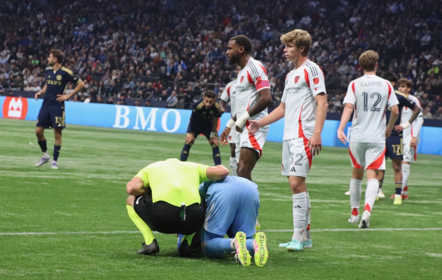 Dallas Goalkeeper Marten Pais, is injured during this match.