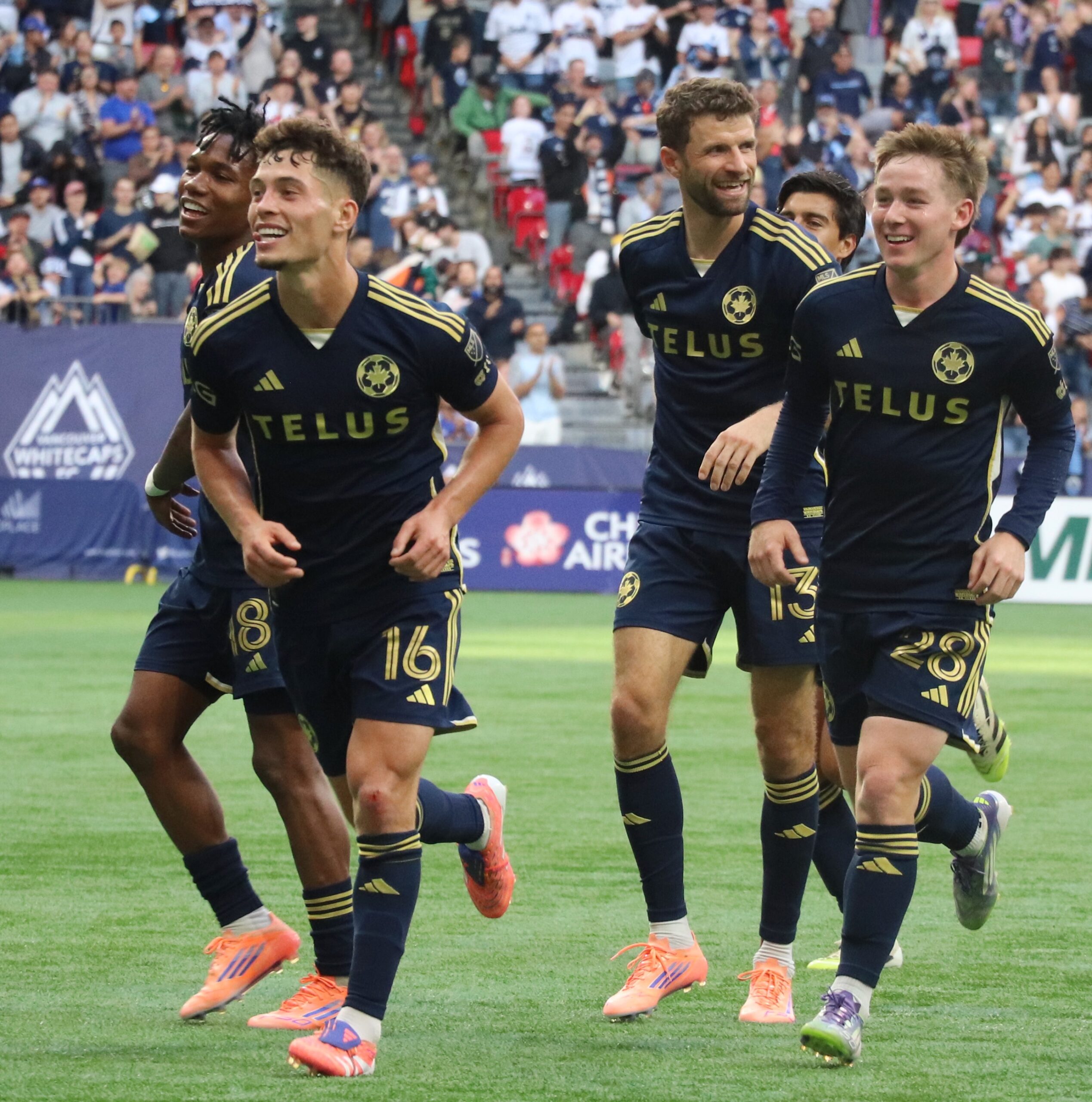 Whitecaps are all smiles as they win the game!