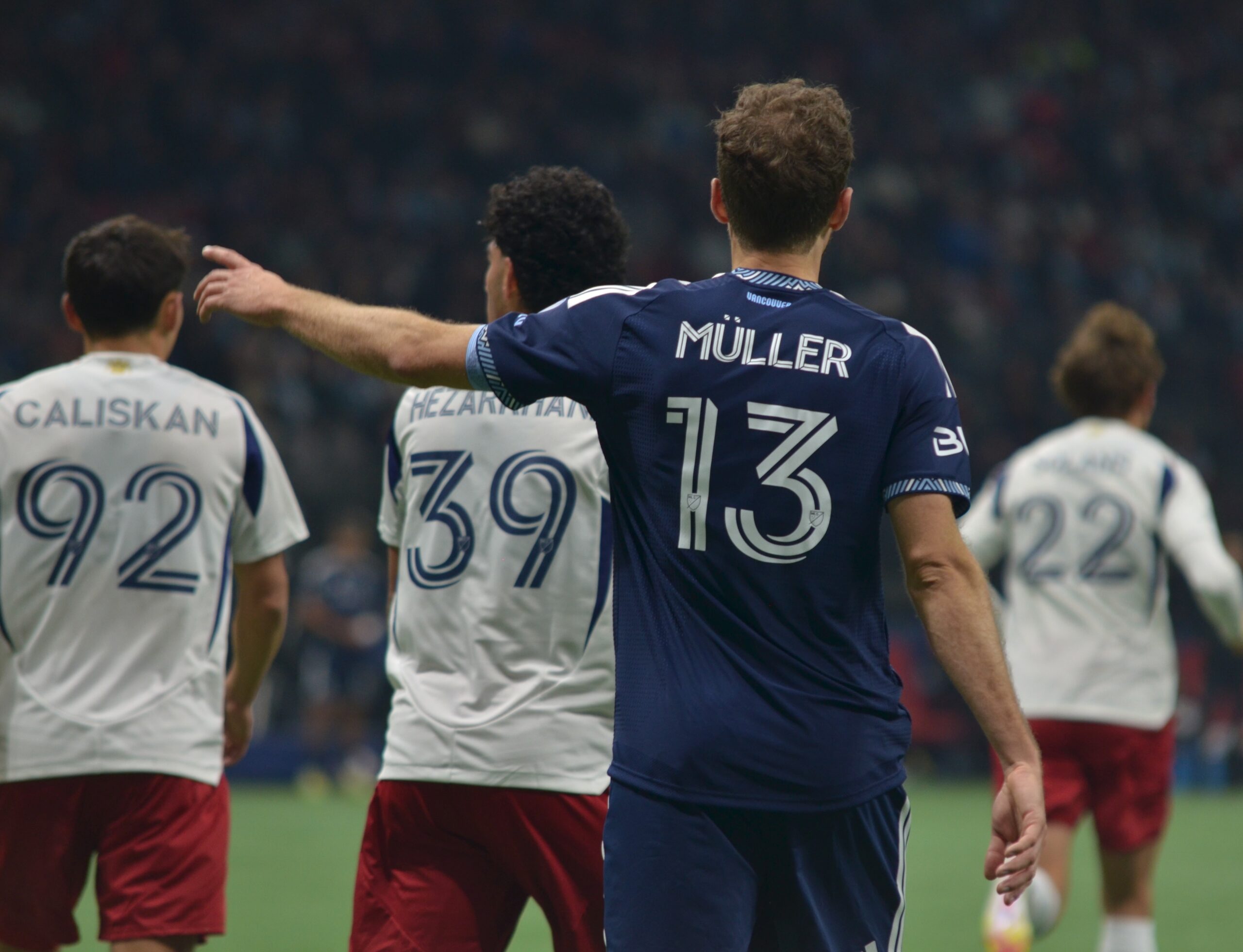 Müller and three members of the RSL Team