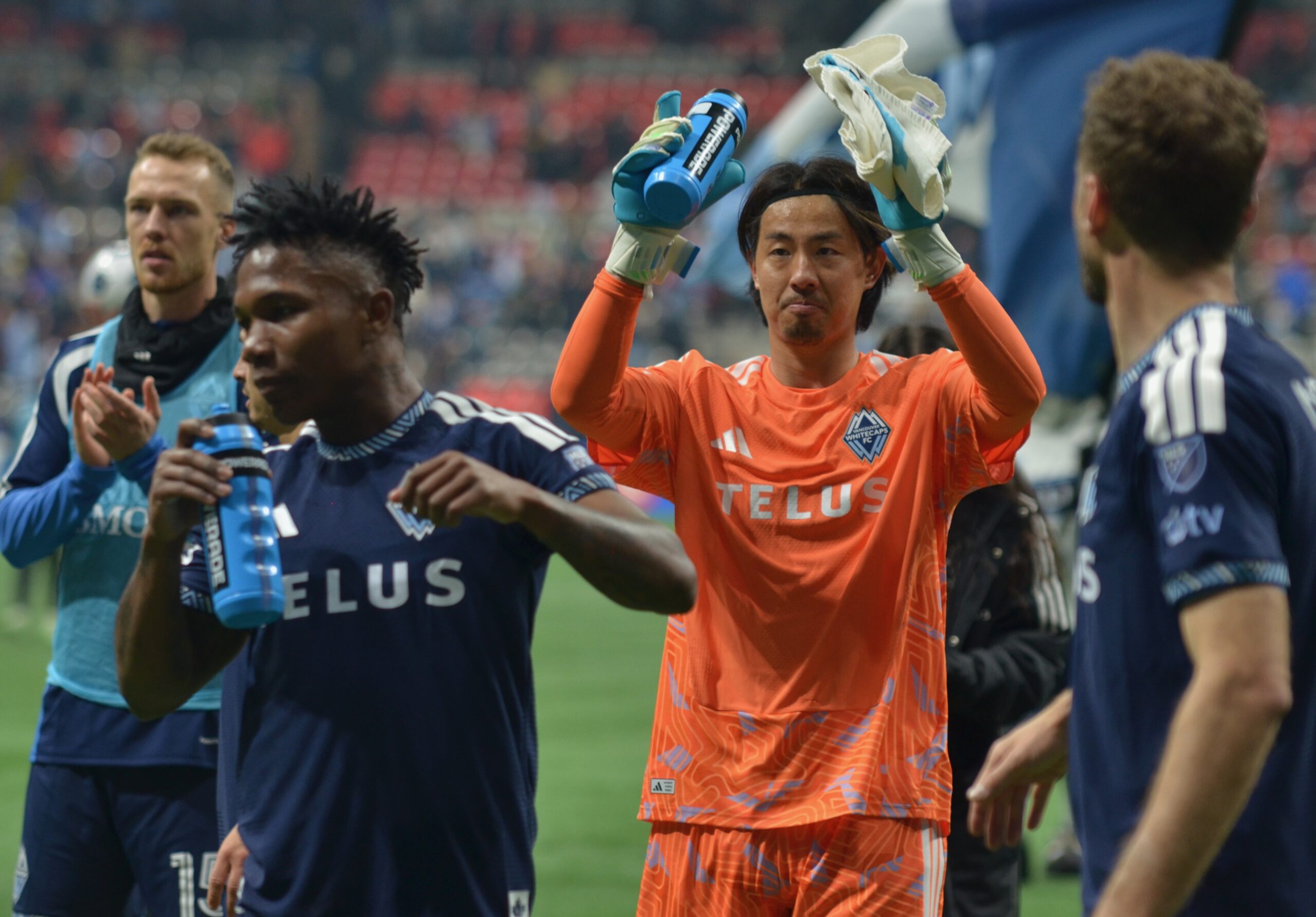 Goalie for the Whitecaps celebrating a clean sheet.