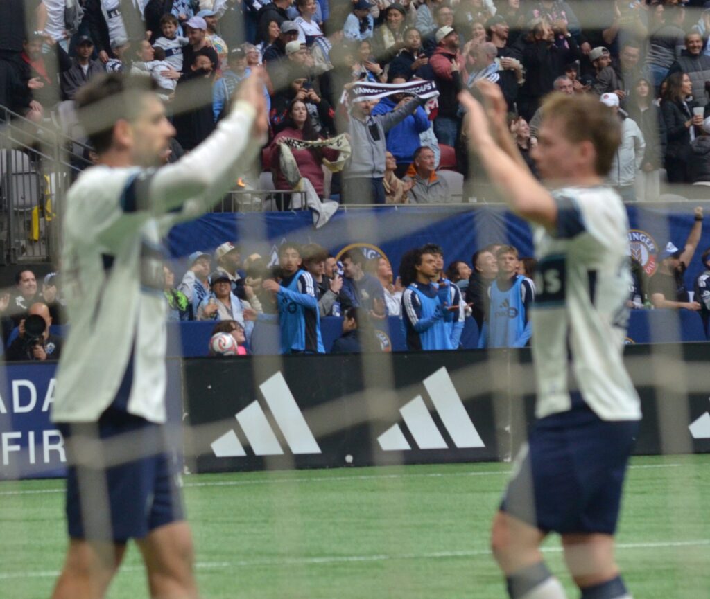 Tate Johnson high fiving Brian White